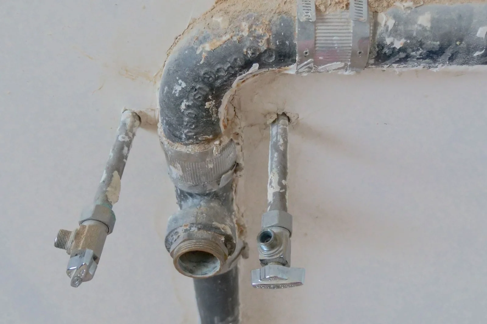 old galvanised supply pipework opened up in one small section of wall during slab leak repair cleveland tn